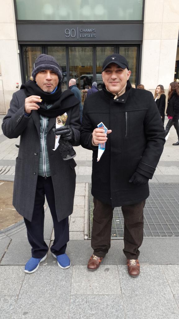 Mazin Kurdi with engineer and businessman Ibrahim Jamjoom on a city street.