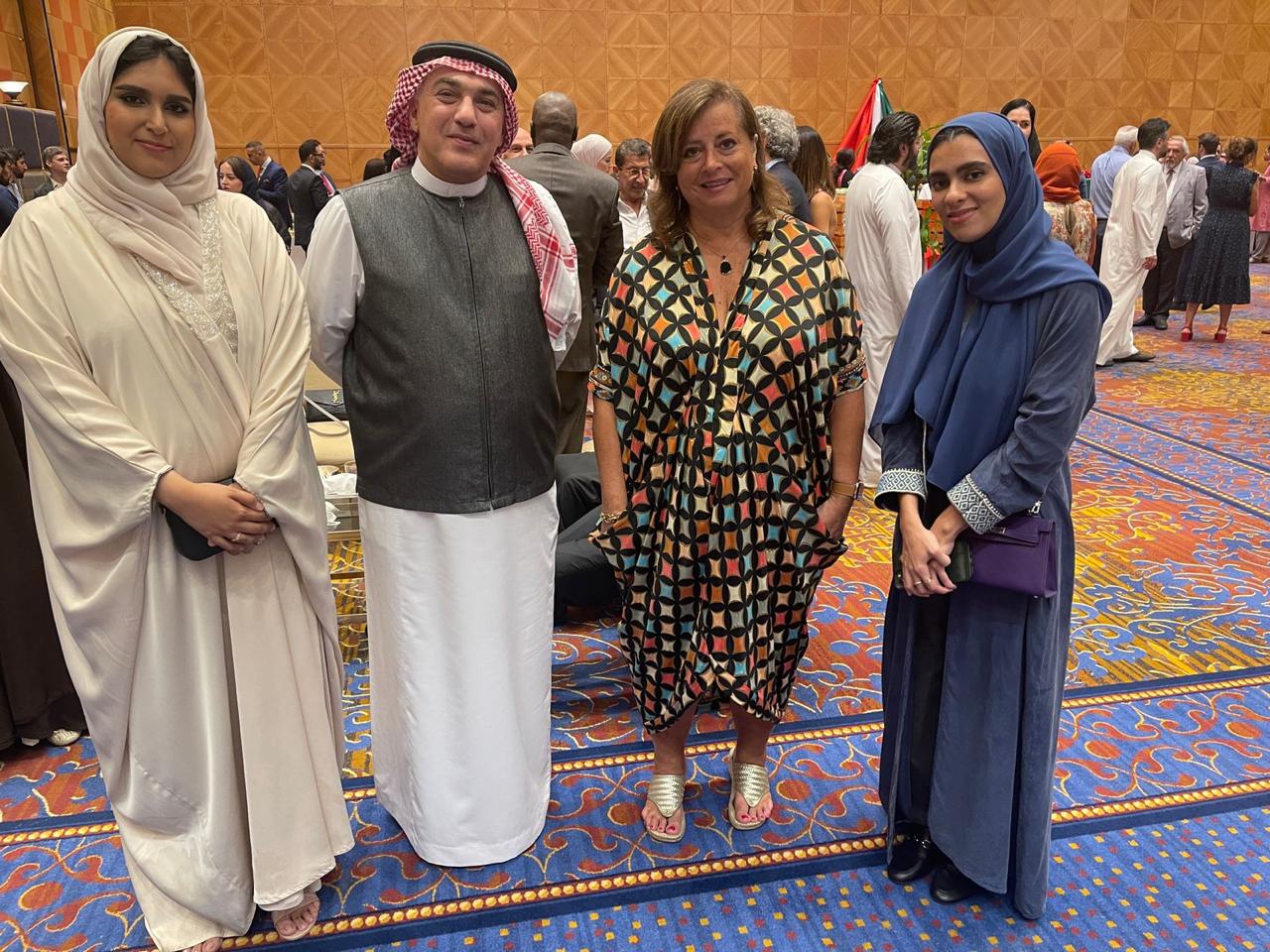 Mazin Kurdi with the Consul General of Italy and guests at an official reception.